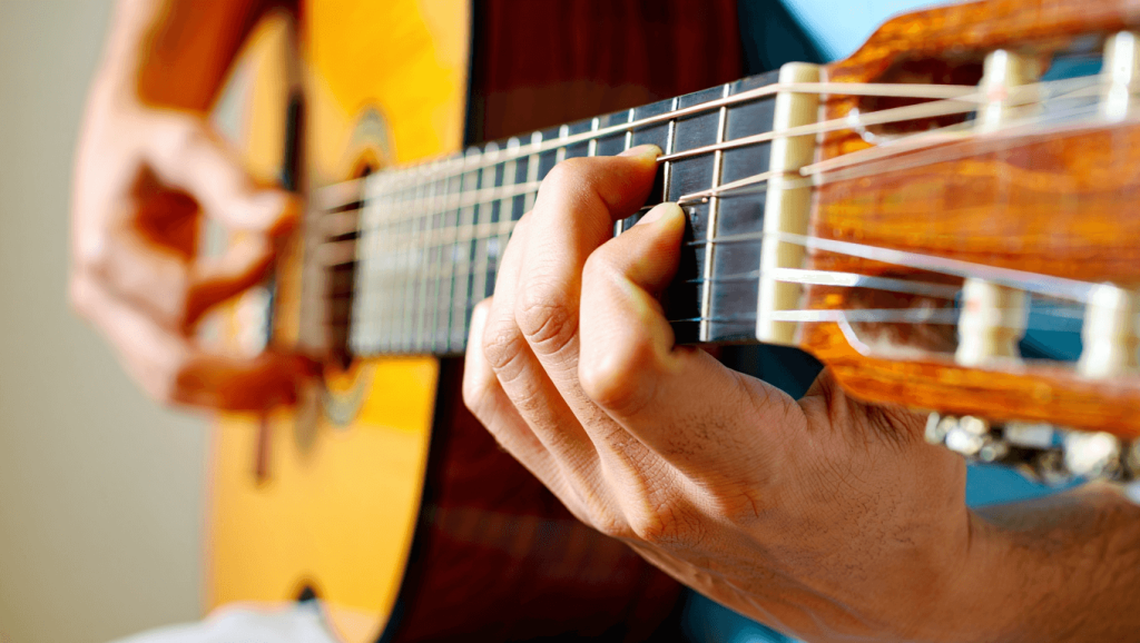 Comment lire une tablature pour guitare : les symboles expliqués